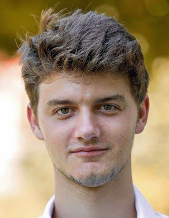 Portrait photograph of Liam Giannini, an OSCP-certified penetration tester from Ticino, Switzerland.